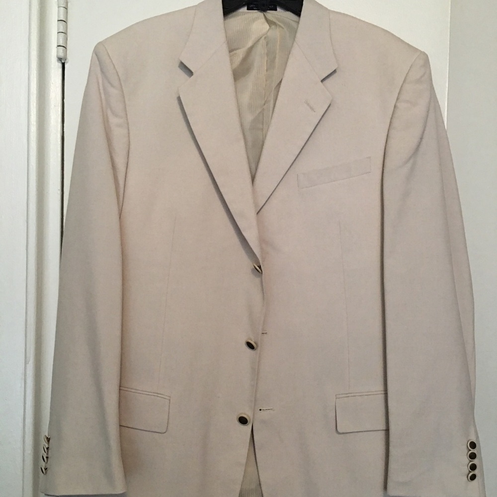 Cream blazer with black buttons